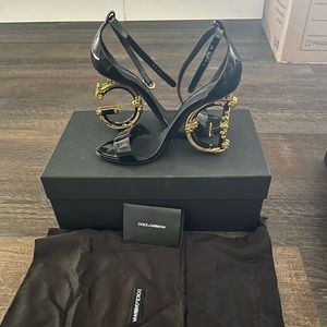 DOLCE&GABBANA
Sculpted-Heel Leather Sandal